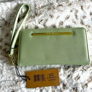Super cute NWT Steve Madden sage color wristlet. Lots of compartments.